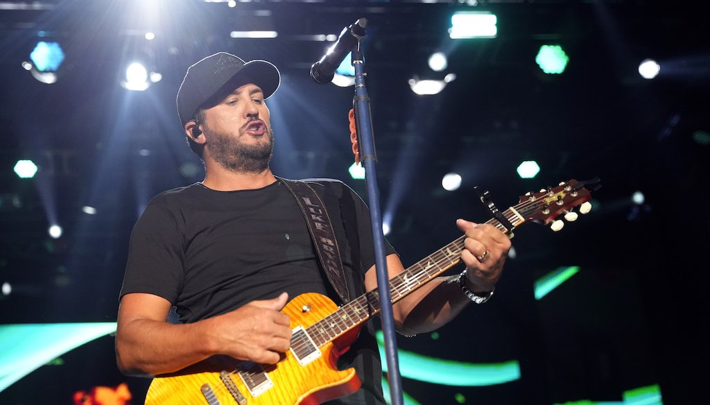 Luke Bryan performs during day three at the Windy City Smokeout festival on July 15, 2023, at the United Center in Chicago. (AP)
