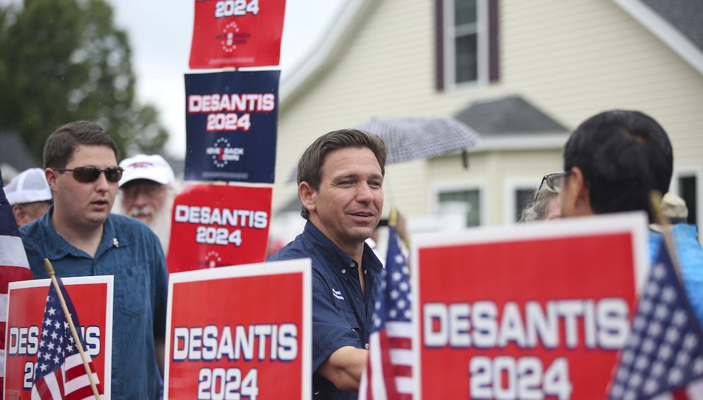 Republican presidential candidate Ron DeSantis walks in the July 4th parade in Merrimack, N.H. (AP)